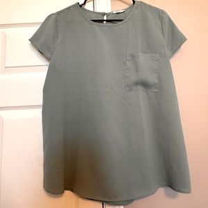 Sage green blouse with front left pocket